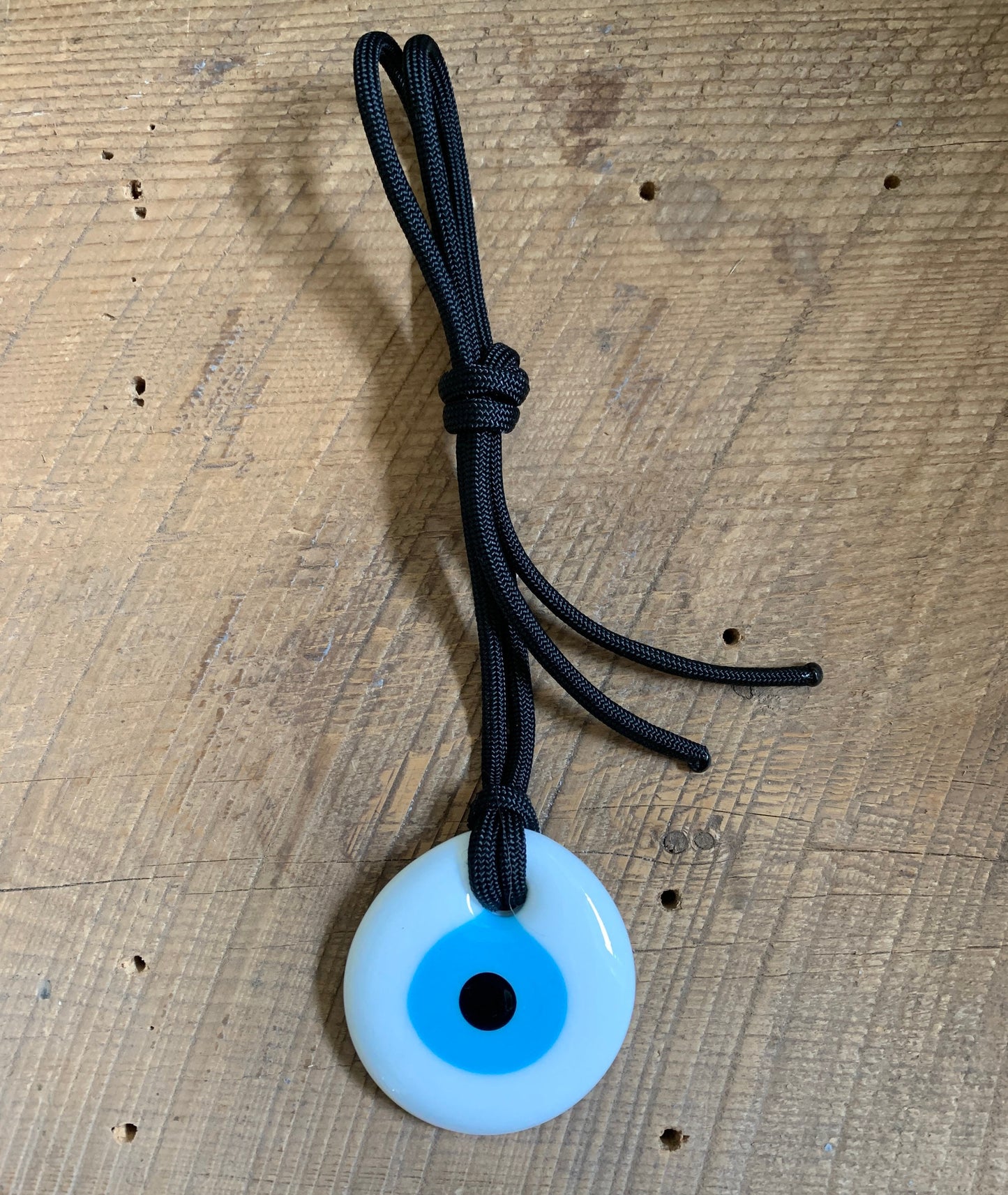 SariBlue® White Glass Evil Eye Pendant