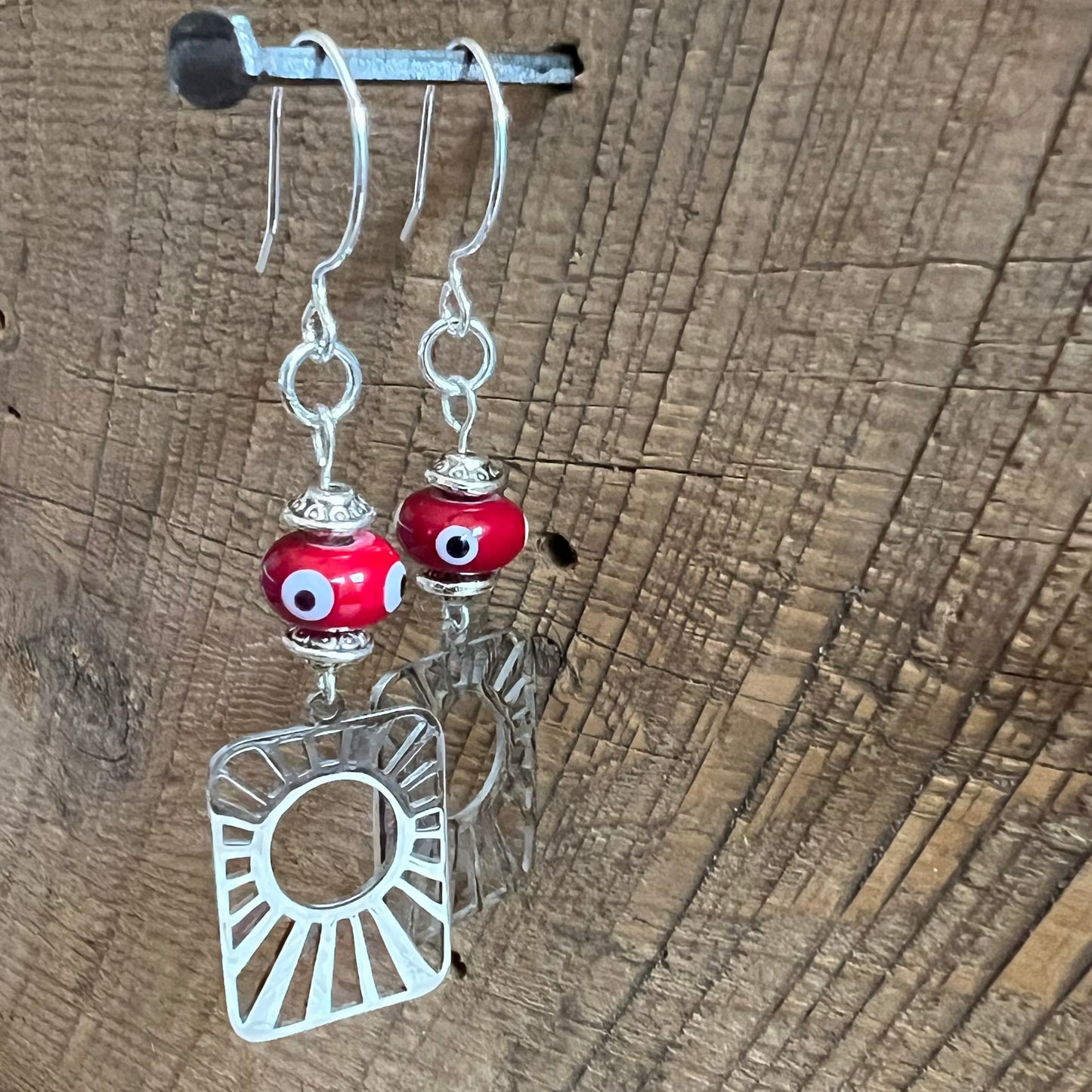 SariBlue® Sunburst with Deep Red Evil Eye Earrings