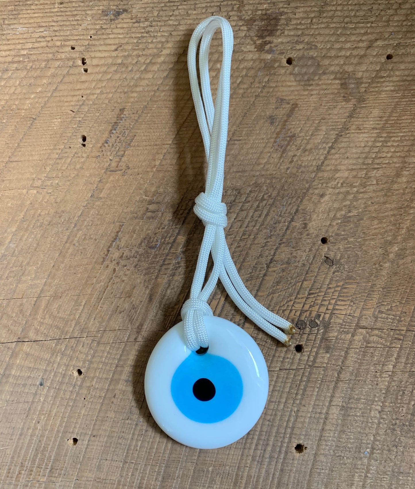 SariBlue® White Glass Evil Eye Pendant