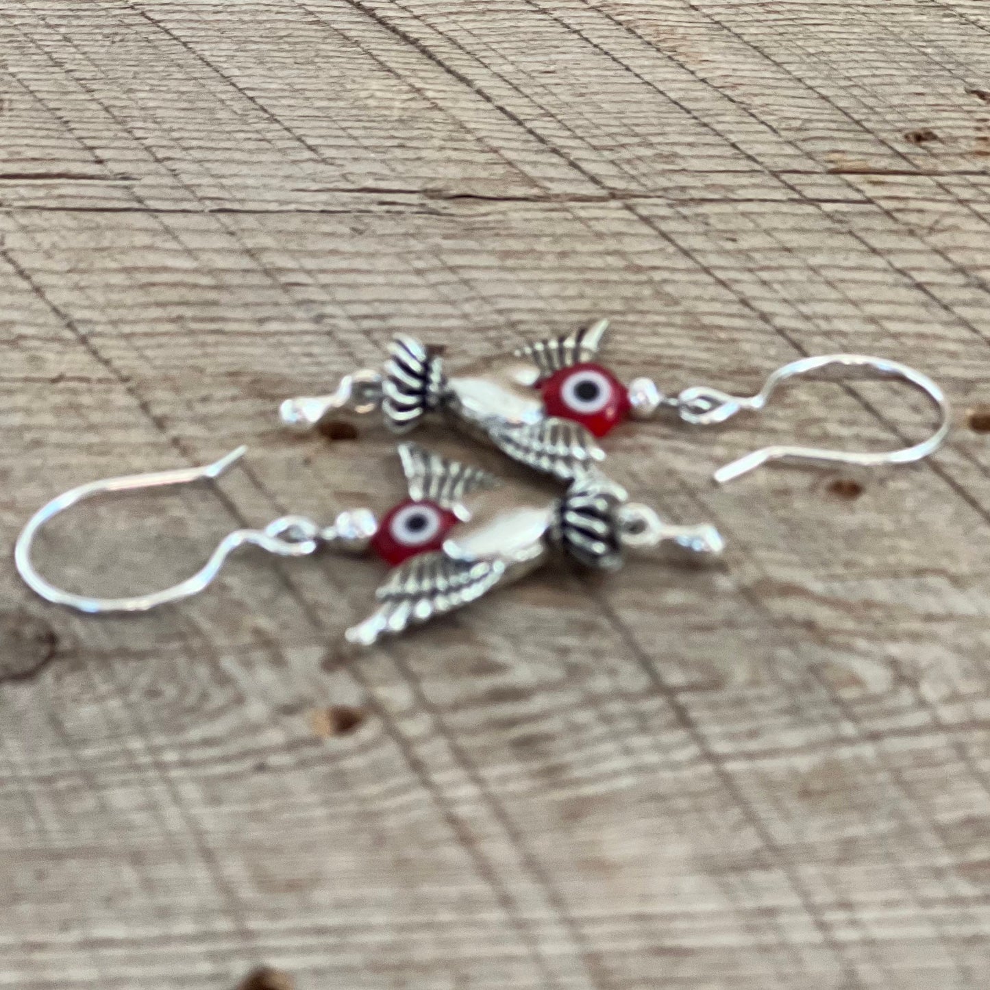 SariBlue® Red Evil Eye and Silver Winged Heart Earrings