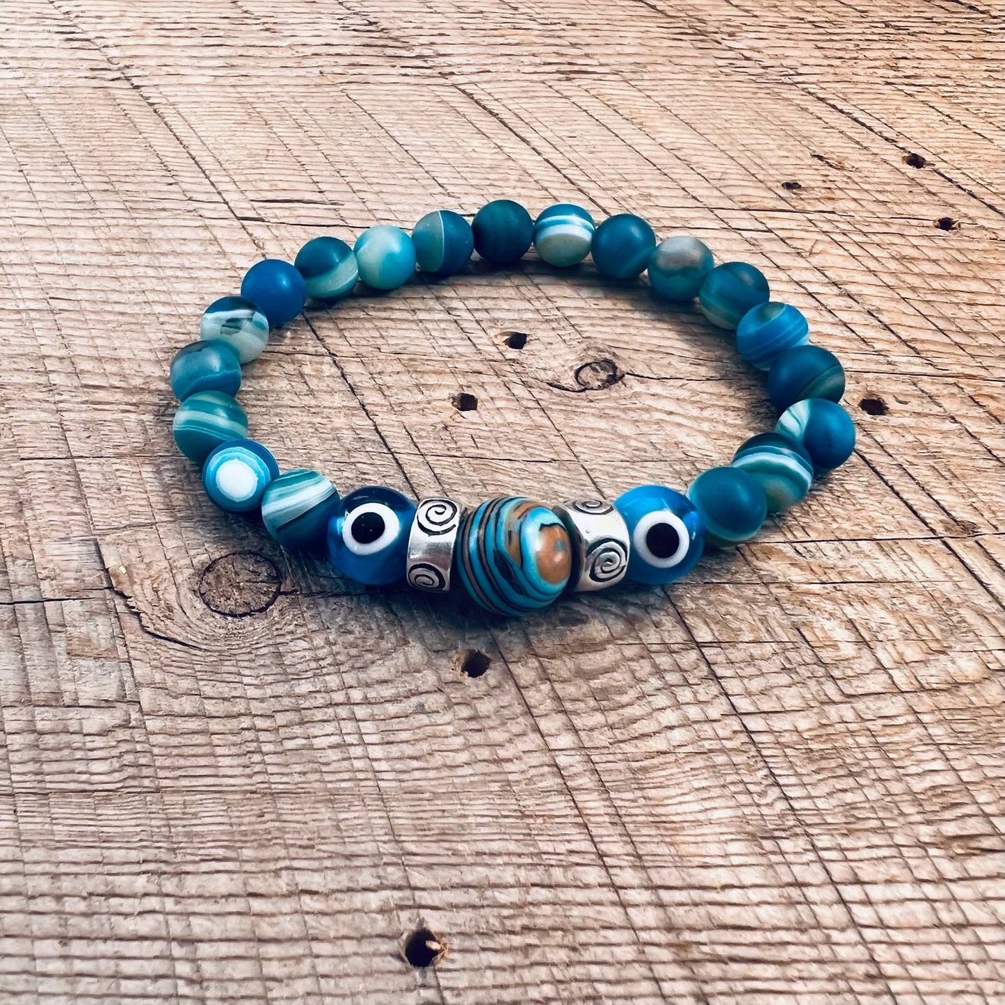 SariBlue® Fordite and Ultra Blue Agate with Light Blue Evil Eye and Pewter Beads Bracelet